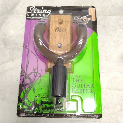 String swing guitar keeper - string,